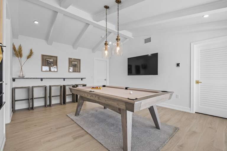 Indoor game room with pool table