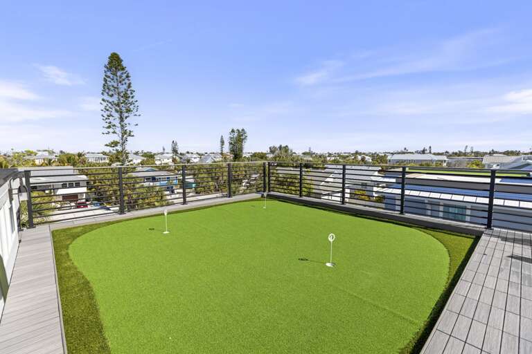 Rooftop deck with putting green and gulf views