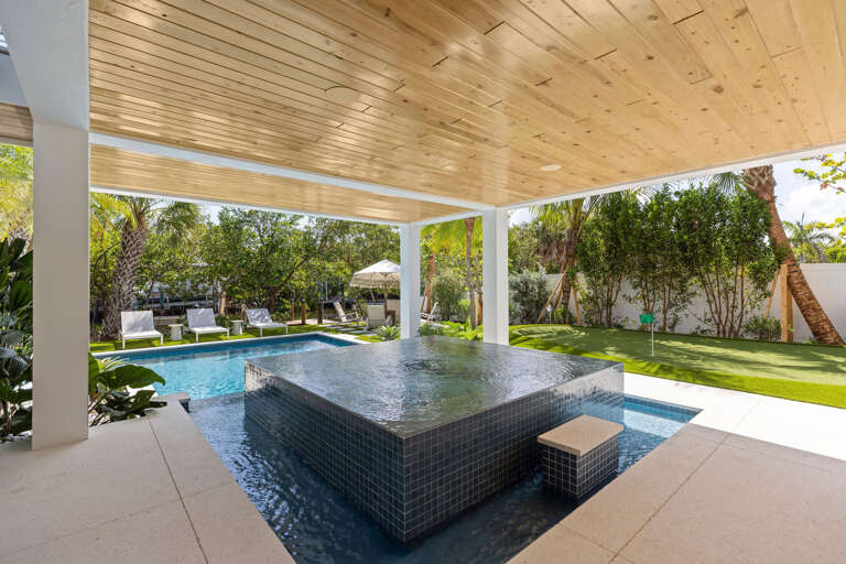 Covered Pool Lounge and Putting Green
