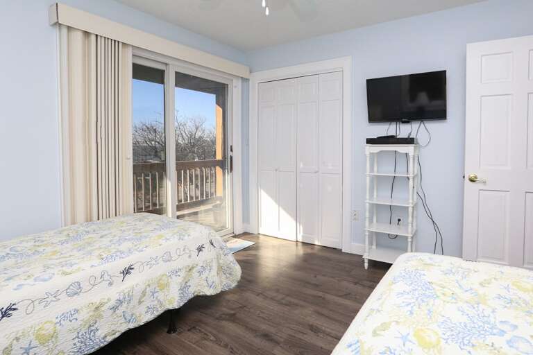 Bedroom 4 2023; Level 2 - 2 Twins with sliding doors to deck