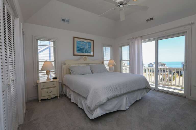 Bedroom 1 2024; King with private bath and sliding doors to deck - Level 3 Bedroom 1 2024; King with private bath and sliding doors to deck - Level 3