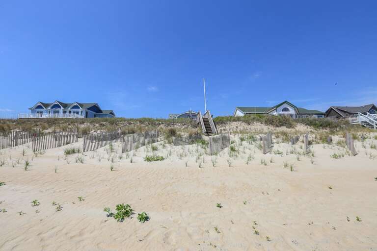 Steps leading from beach to dune deck 2025 Steps leading from beach to dune deck 2025
