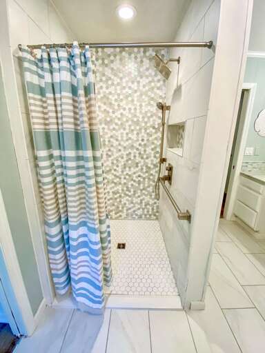 Bathroom 2 2023; Shared to Hall and Bedroom 1 - Level 1