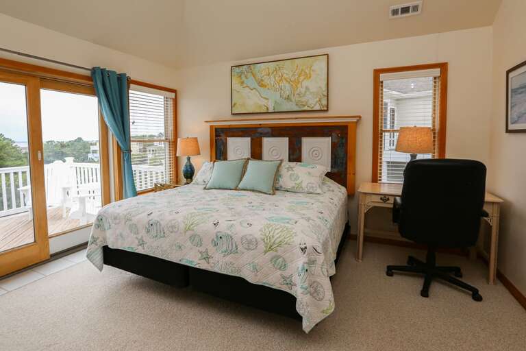 Bedroom 1 2024; King with private bath, 55 inch TV and sliding doors to deck - Level 3