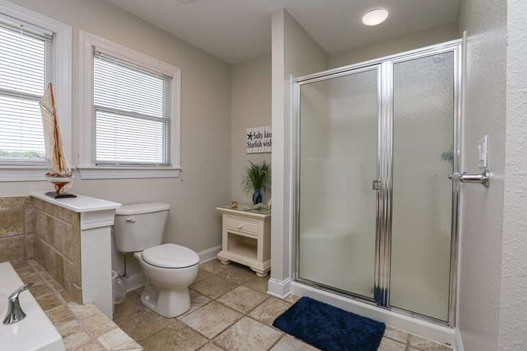 Bathroom 2 2024; Private to bedroom 1 with jetted tub and walk in shower - Level 3