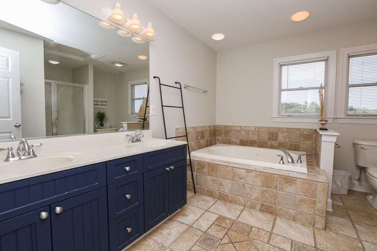 Bathroom 2 2024; Private to bedroom 1 with jetted tub and walk in shower - Level 3