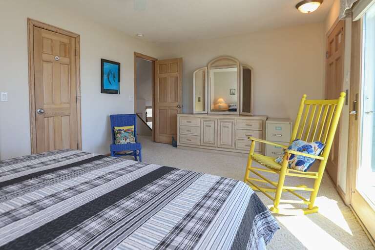 Bedroom 1 2025 - King with Deck and Elevator (behind yellow chair) Access - Level 5