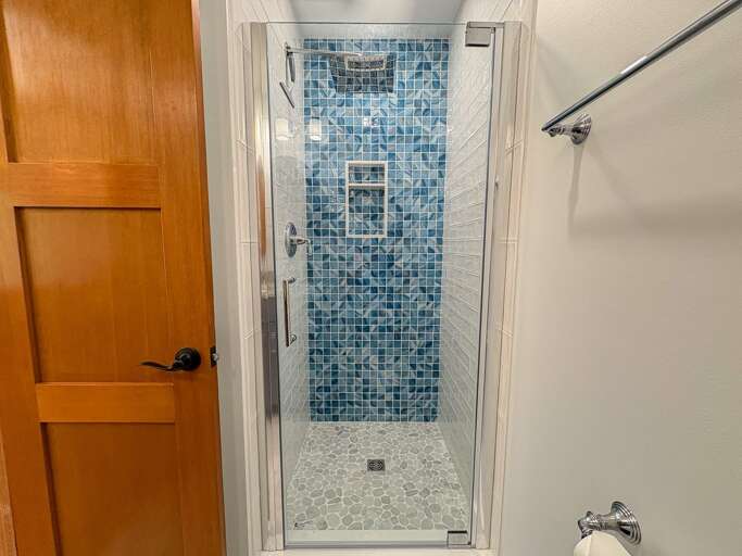 Bathroom 1 - Full hallway bath with walk in, tiled shower 2025 - Level 3