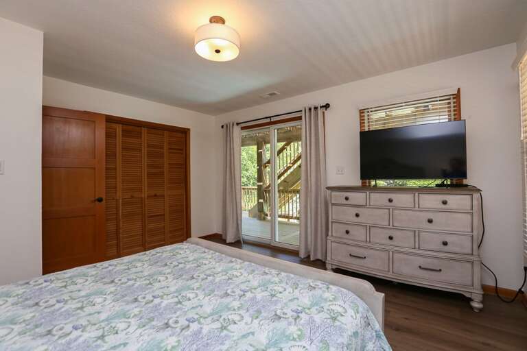 Bedroom 2 2025 - Queen with access to covered deck overlooking pool - Level 2