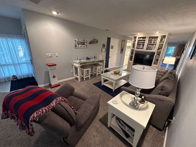 Living room with a pull-out sleeper queen size sofa.