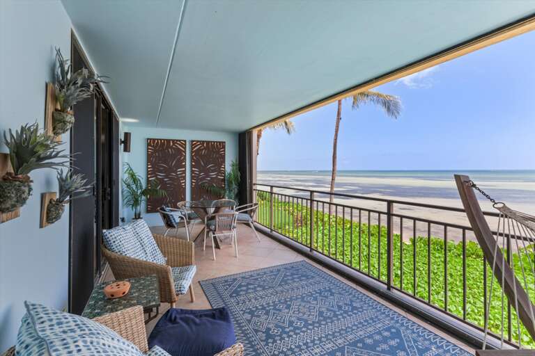 Oceanfront balcony with seating