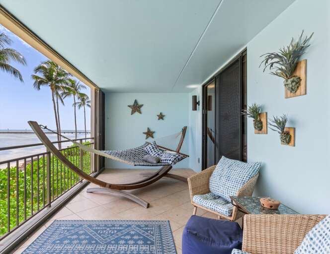 Oceanfront balcony with seating