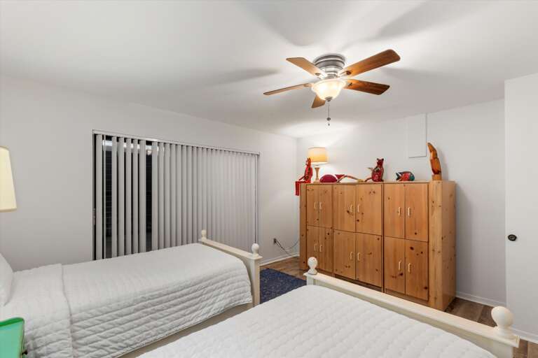 2nd Bedroom with doors to entry seating area