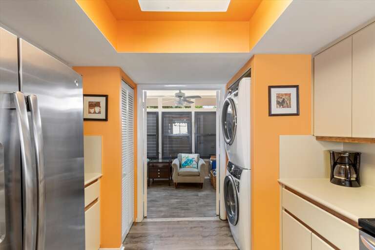 Kitchen/washer & dryer into front entry seating area