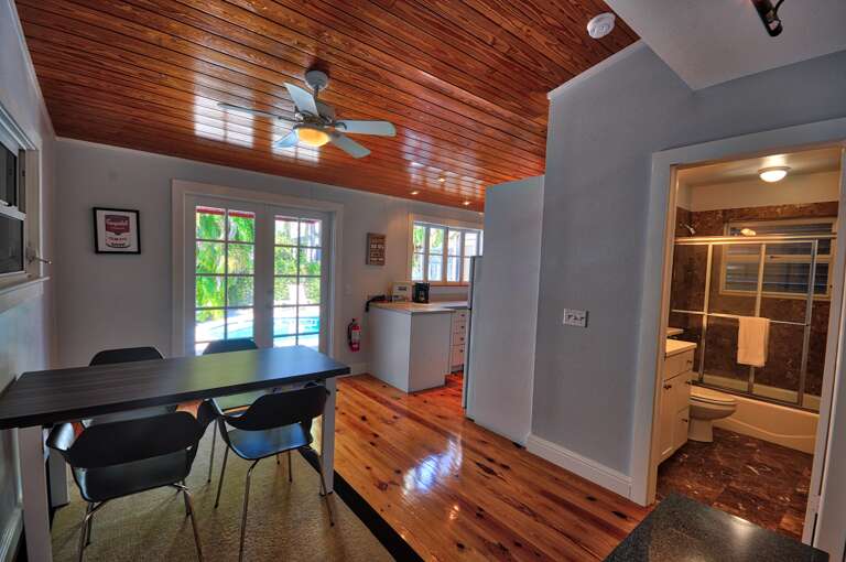 Dining Area and Bathroom Pete's West Cottage Key West Dining Area and Bathroom Pete's West Cottage Key West