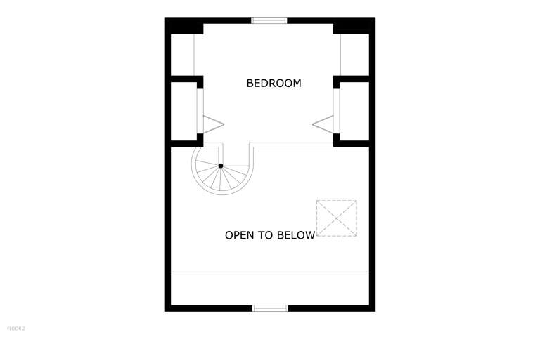 Upper floor featuring a private bedroom and a dramatic open-to-below design that enhances the home's spacious and airy feel.