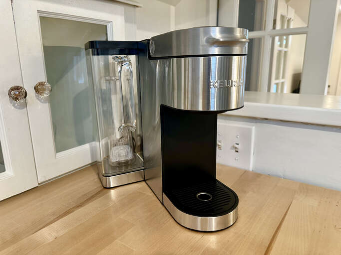 Keurig coffee maker on wet bar on the 3rd floor of main house.