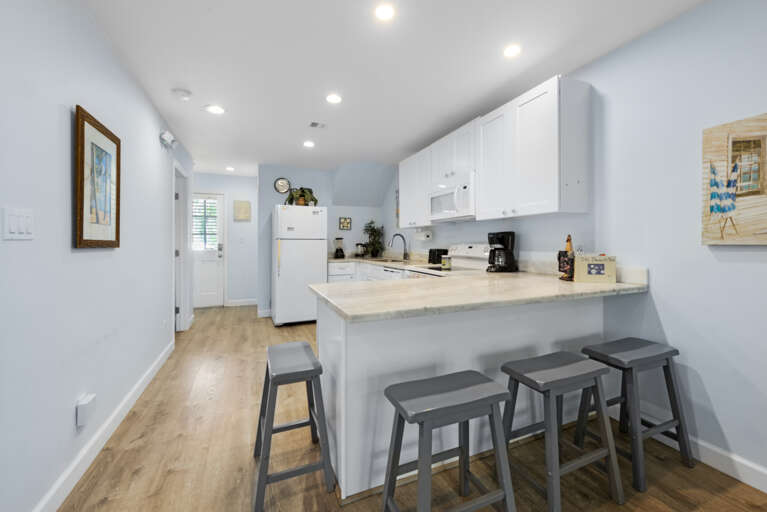 Tiki Beach Too Kitchen with peninsula seating Tiki Beach Too Kitchen with peninsula seating