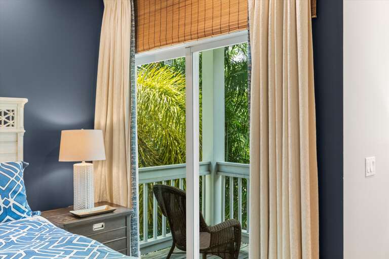 Upstairs main bedroom - King - with balcony seating area