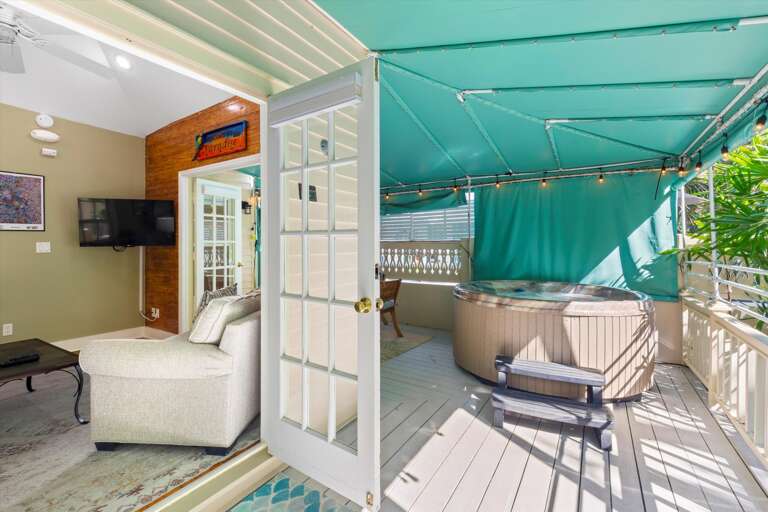 French doors to Poolside Hide-Away / Wrap around porch with private hot tub French doors to Poolside Hide-Away / Wrap around porch with private hot tub