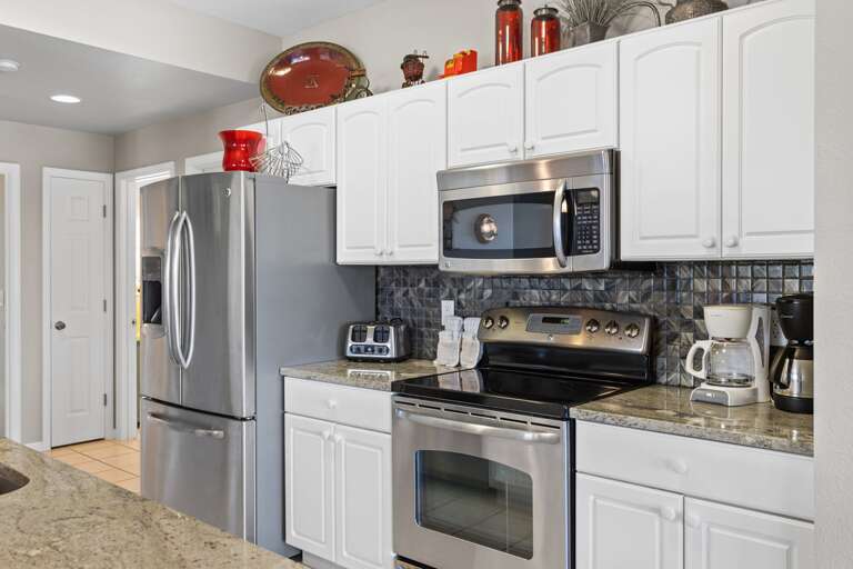 Stylish Stainless Steel Kitchen In Serene Vacation Rental Space