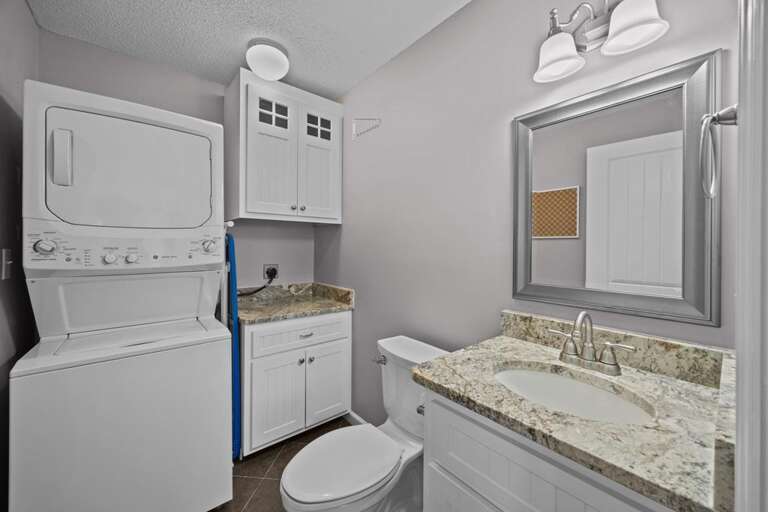 Half Bath and Laundry Area off Kitchen
