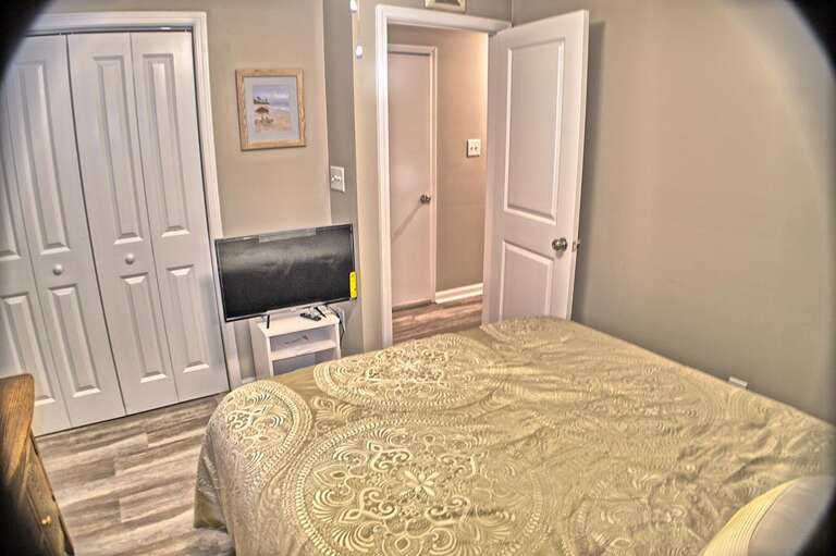 Bedroom has Flat Screen TV