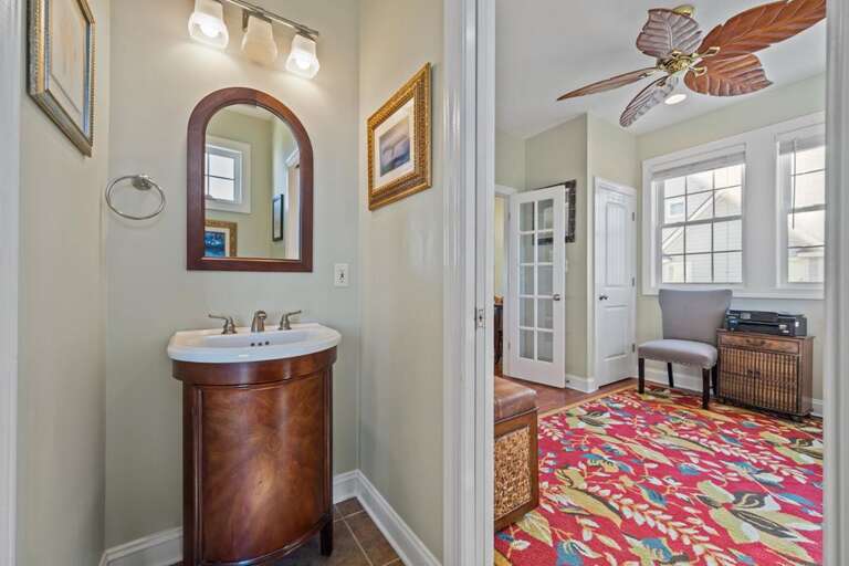 Half bath off Living Room and Sitting Area