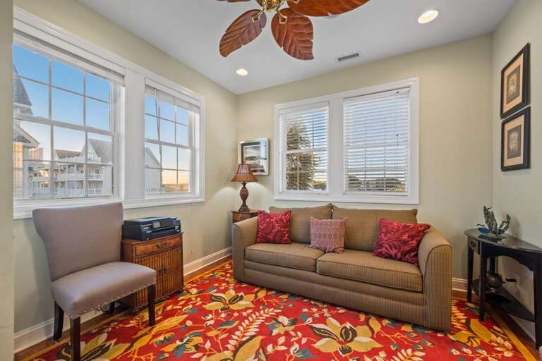 Sitting Area with Queen Sleeper Sofa