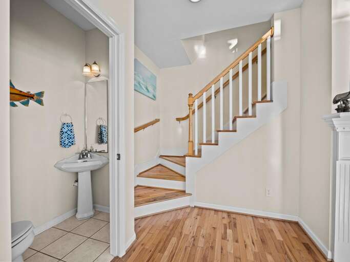 Half Bath Off Living Room and Stairway Up