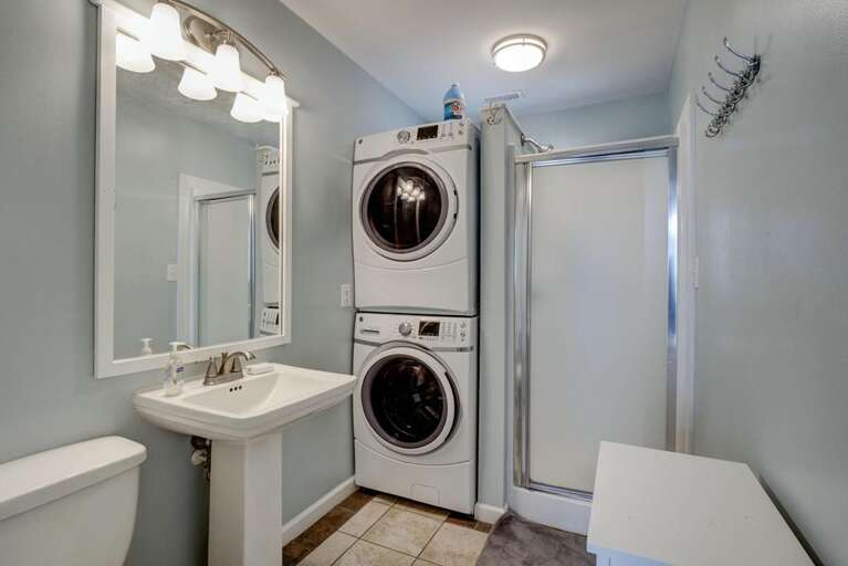 Bathroom with Walk in Shower and Laundry Area