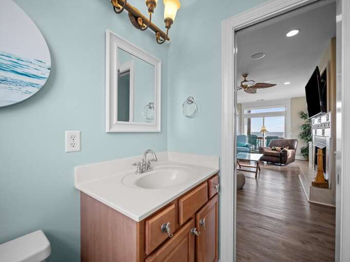 Half Bath off Living Room and Kitchen