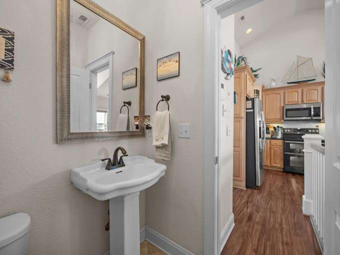 2nd Level Half Bath off Kitchen