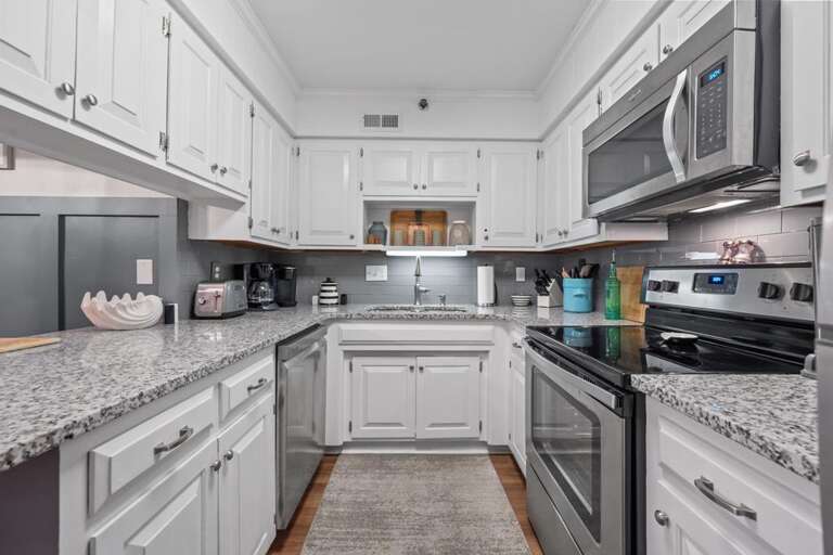 Expansiove Kitchen with Granite Countertops