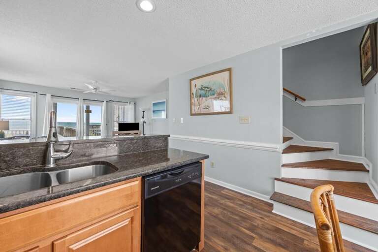 Kitchen and Steps to Bedroom Level