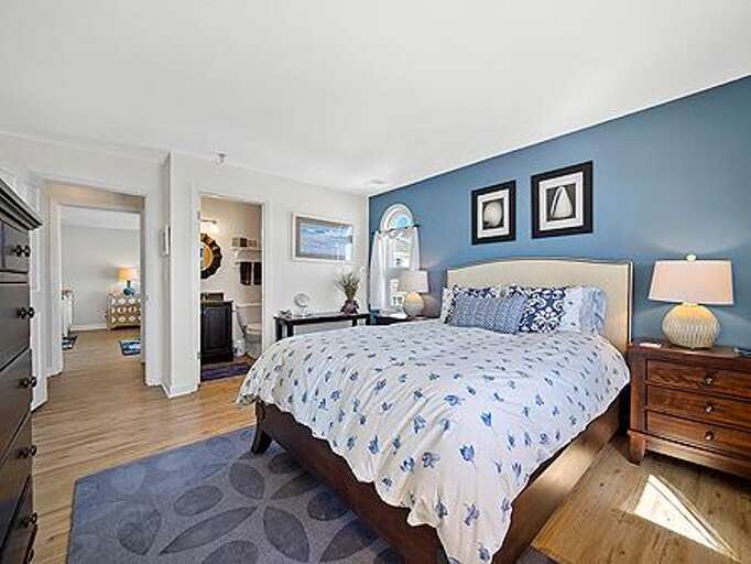 Bedroom 2 has a Queen Bed and Balcony Access