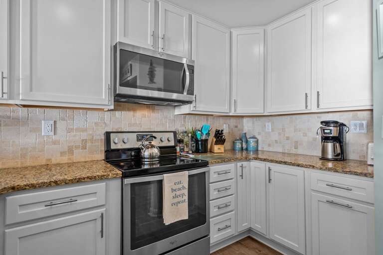 Kitchen with Granite and Tile Backsplash