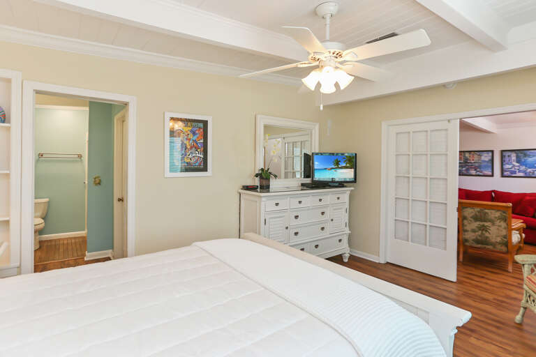 Bedroom 1 with View into Small Living Room