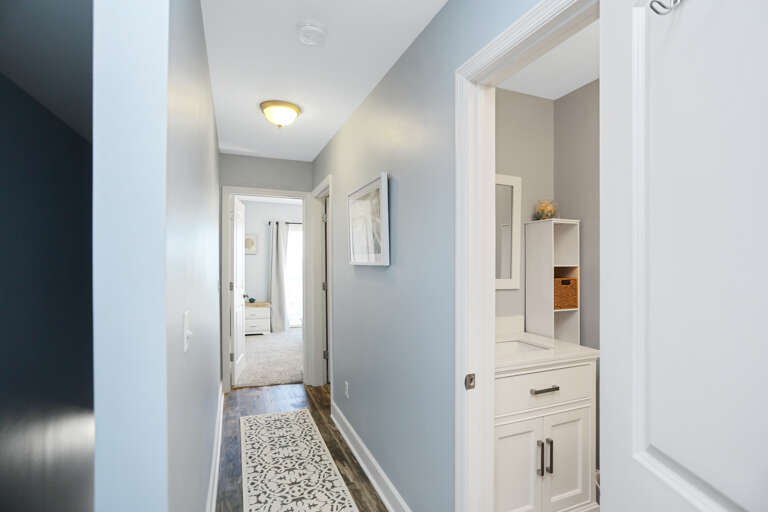 Upstairs hallway between bedroom and hall bathroom