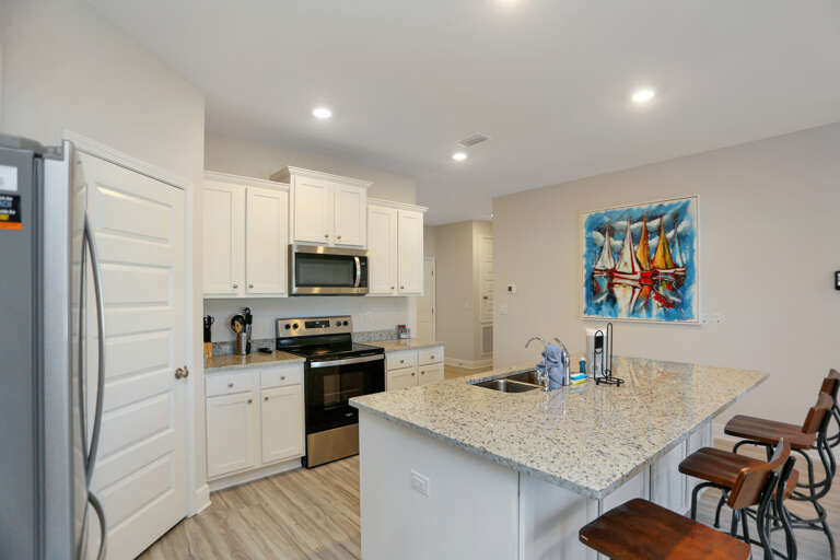 Kitchen Area with Beautiful Artwork