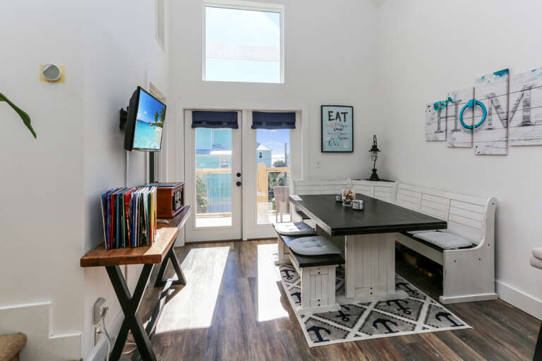 Gulf View Dining Area with TV