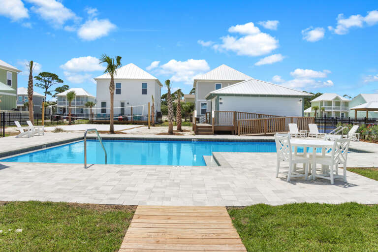 Community Pool with Pool Furniture and Outdoor Restrooms