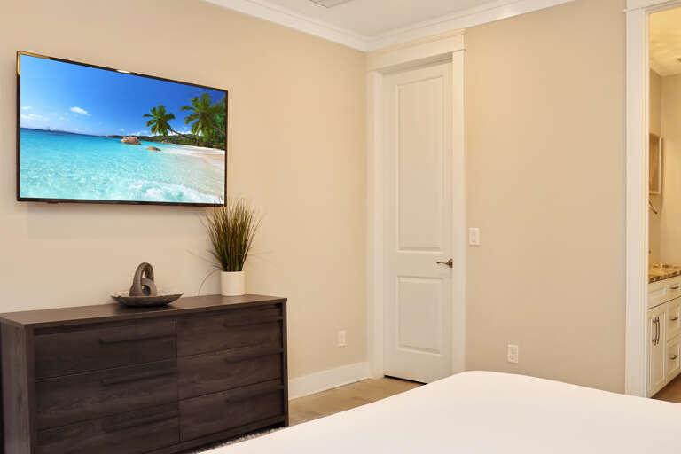 Bedroom 1 with TV and Master Bath