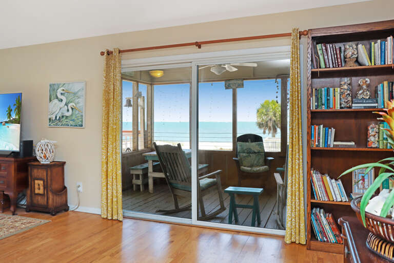 View onto Screened Porch from Living Area View onto Screened Porch from Living Area