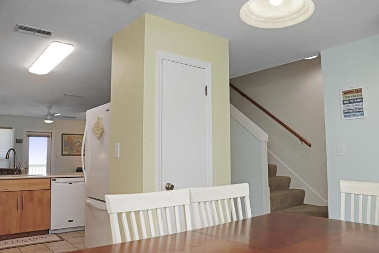Dining, Kitchen and Stairs to Second Floor