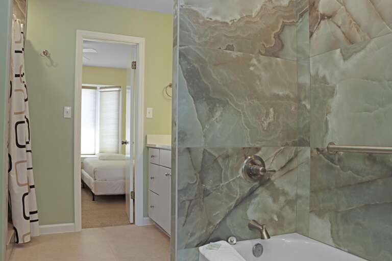 Shared Bathroom with Combo Tub and Shower