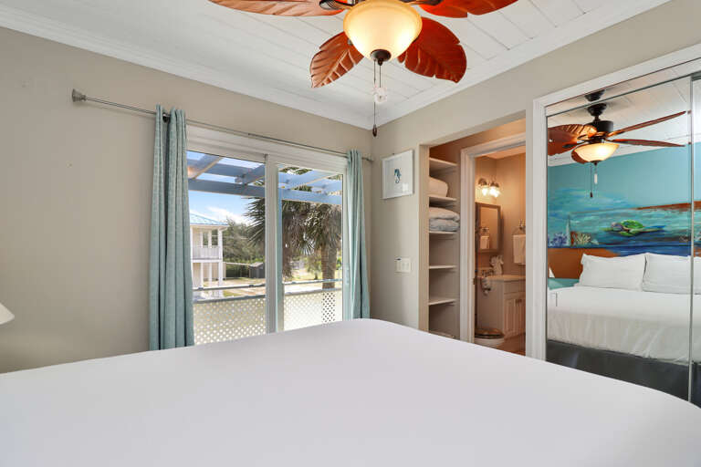 Bedroom 2 with Full Bath Access and Deck View