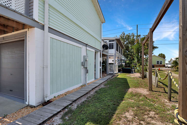 Walkway to Backyard with Main Entrance
