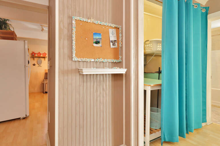 Hallway with View into Kitchen and Full Bath