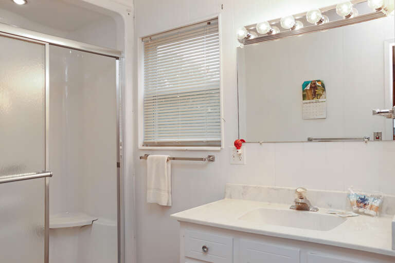 Upstairs Full Bath off of Kitchen